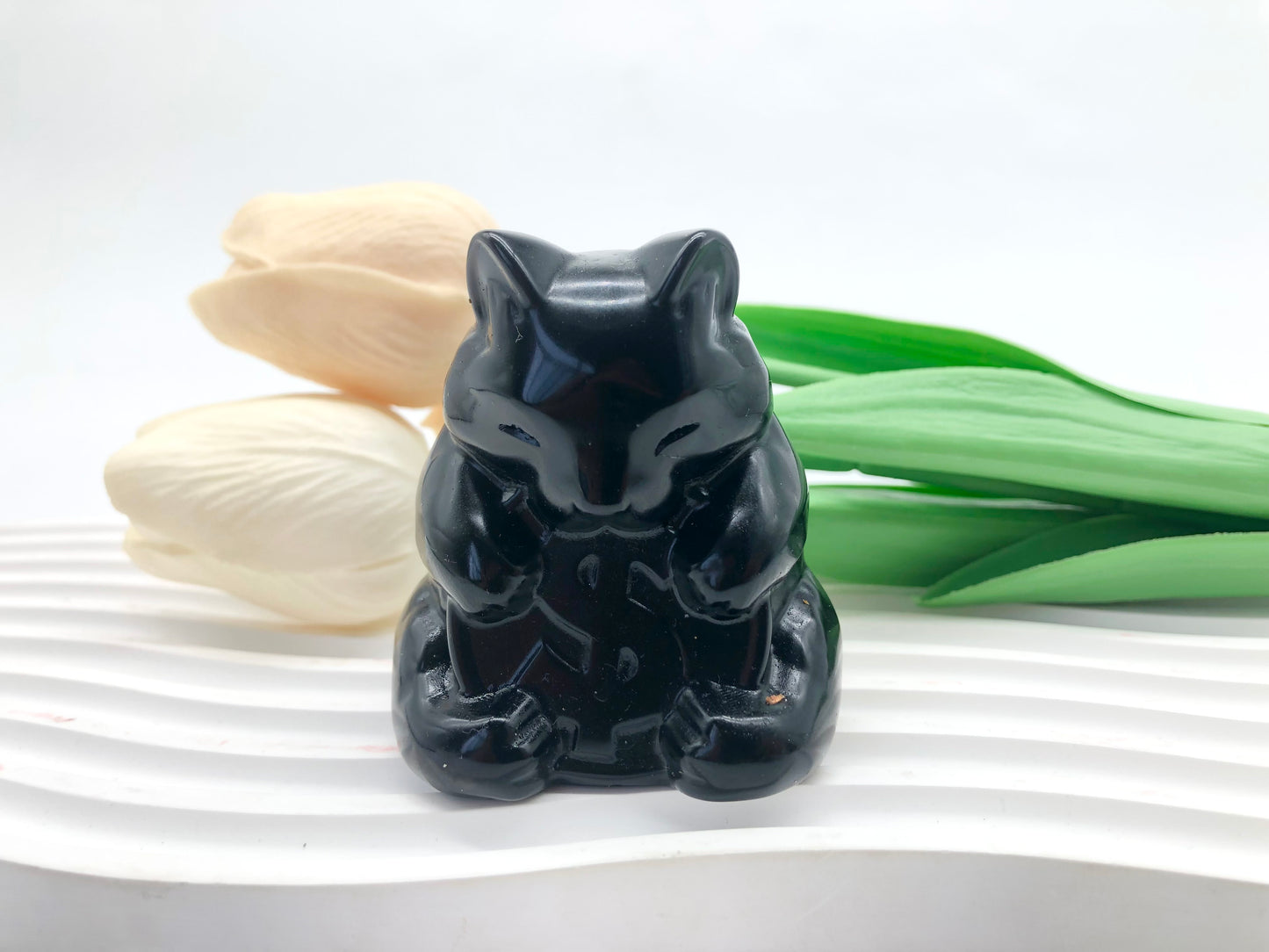 Black obsidian cat carving