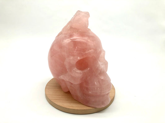 Rose quartz skull with lizard carving