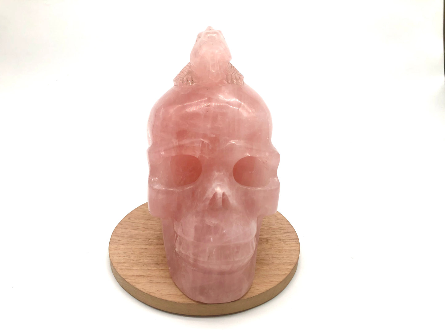 Rose quartz skull with lizard carving