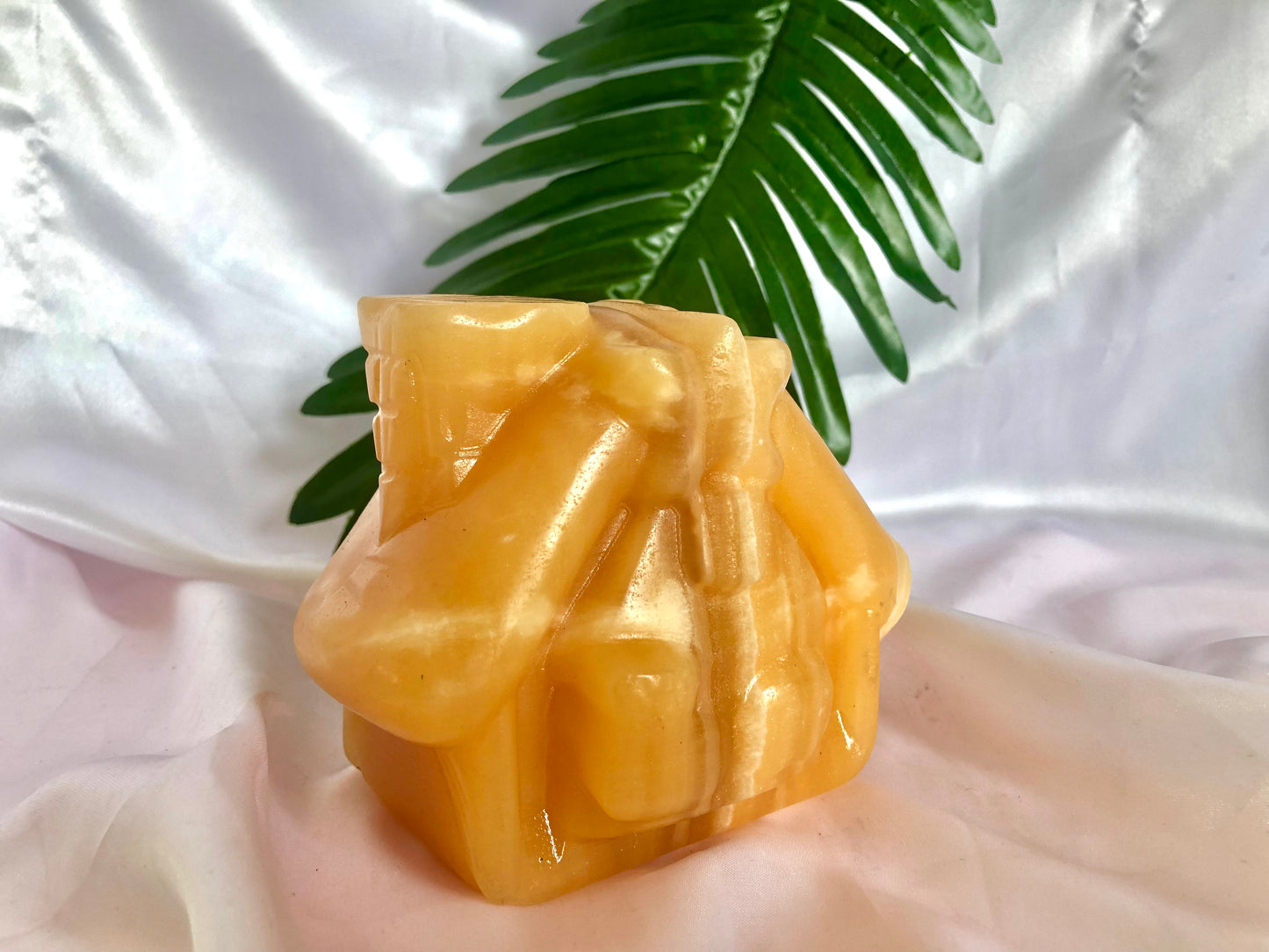 Orange calcite house carving