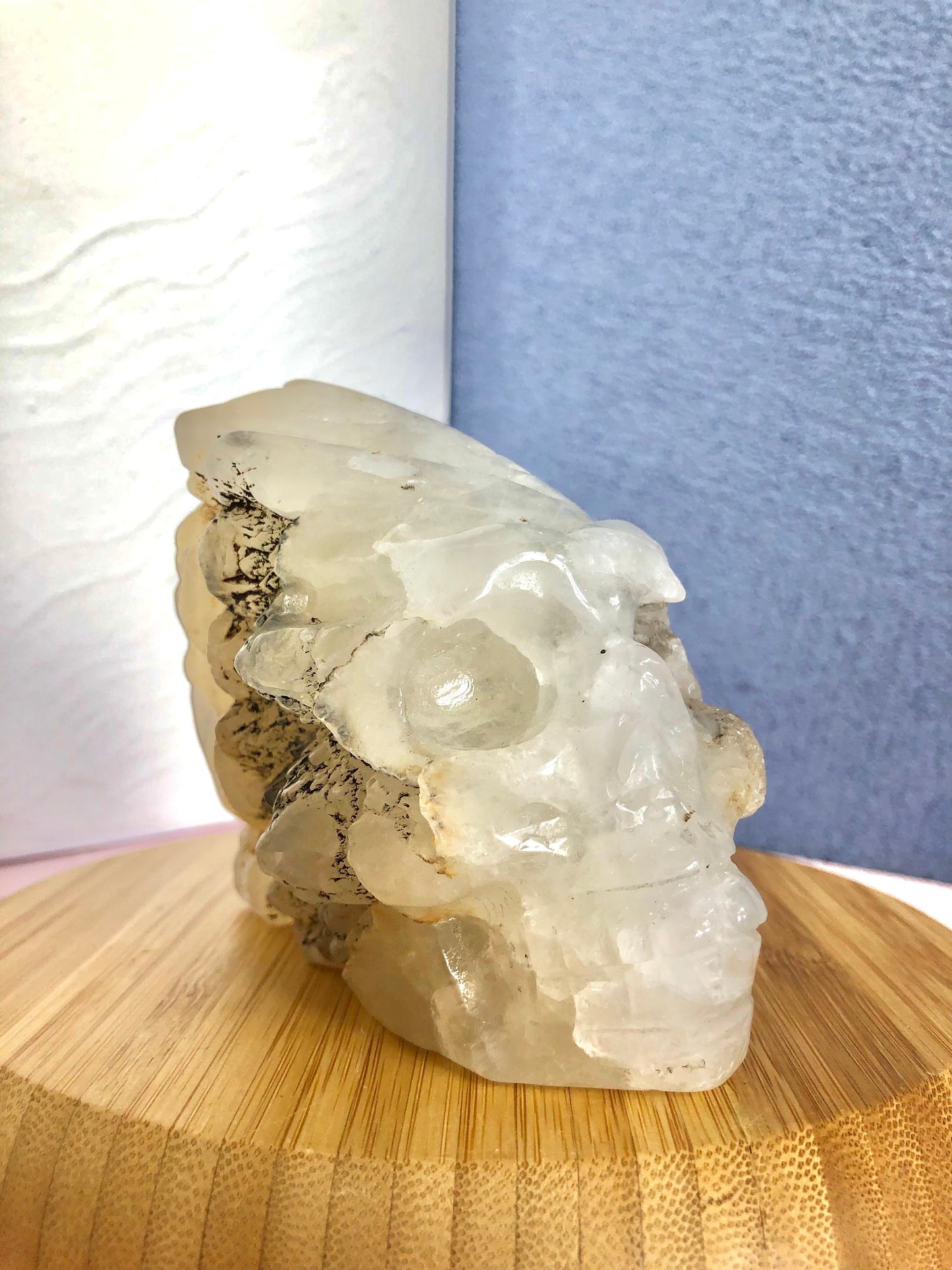 Clear quartz with agate skull