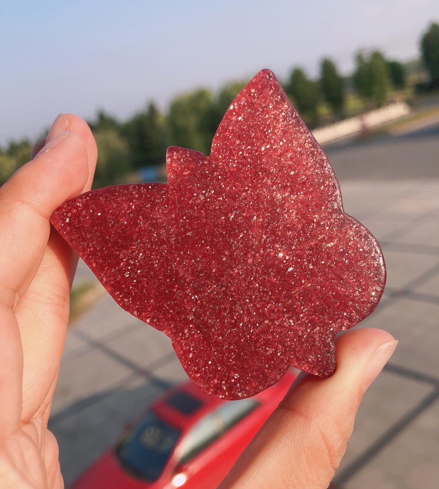 Strawberry quartz butterfly carving