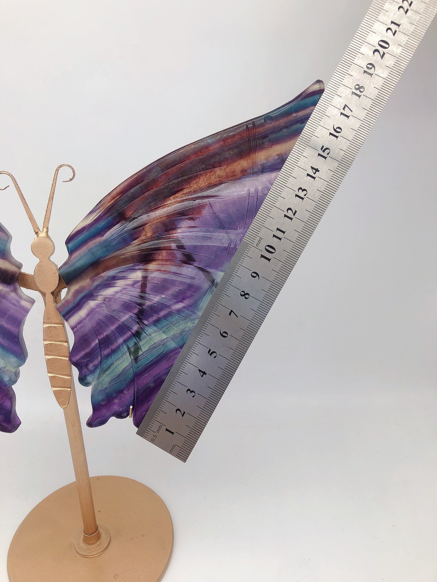 Rainbow fluorite wing carving